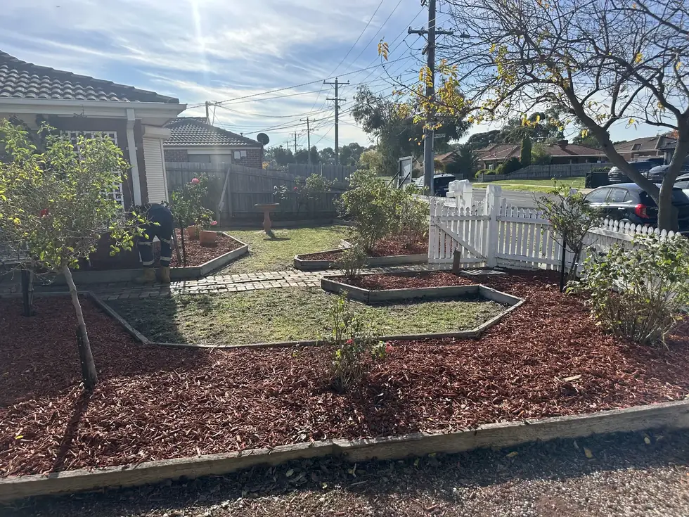 Soil and mulch moved and spread on site by C&J with a mini-loader